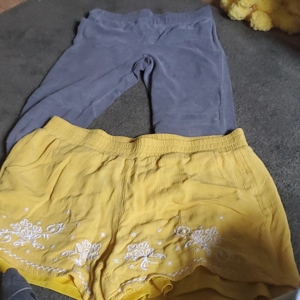 Grey leggings small and yellow shorts large